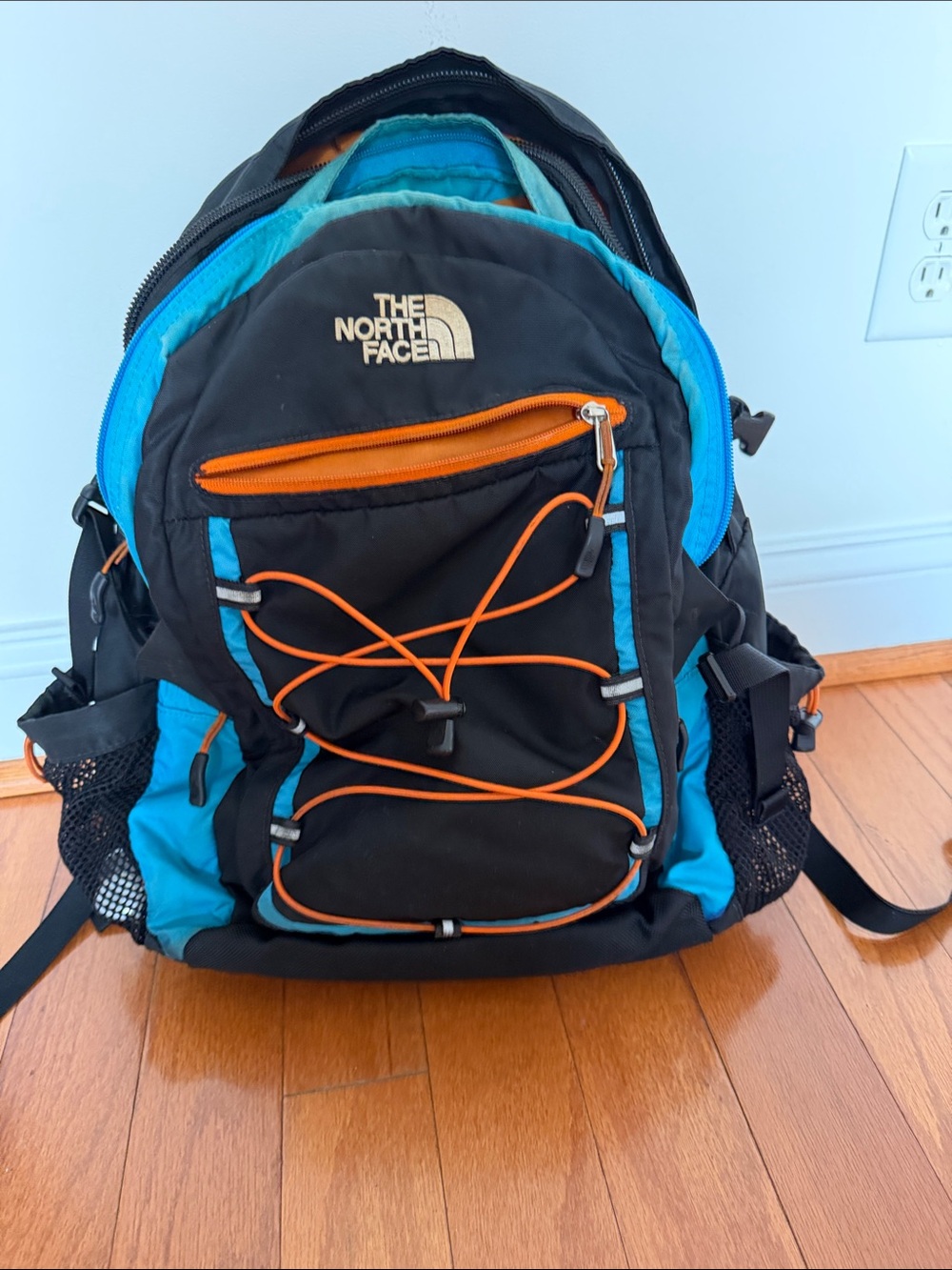 The North Face Black & Blue Men's Backpack with Orange Accents
